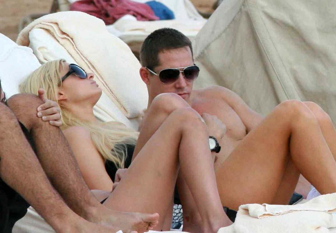 9P Paris Hilton leggy in mini skirt and black stockings and making out with boyfrie