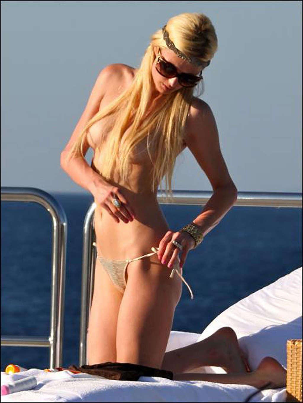 16P Paris Hilton enjoying on yacht in topless and showing sexy body