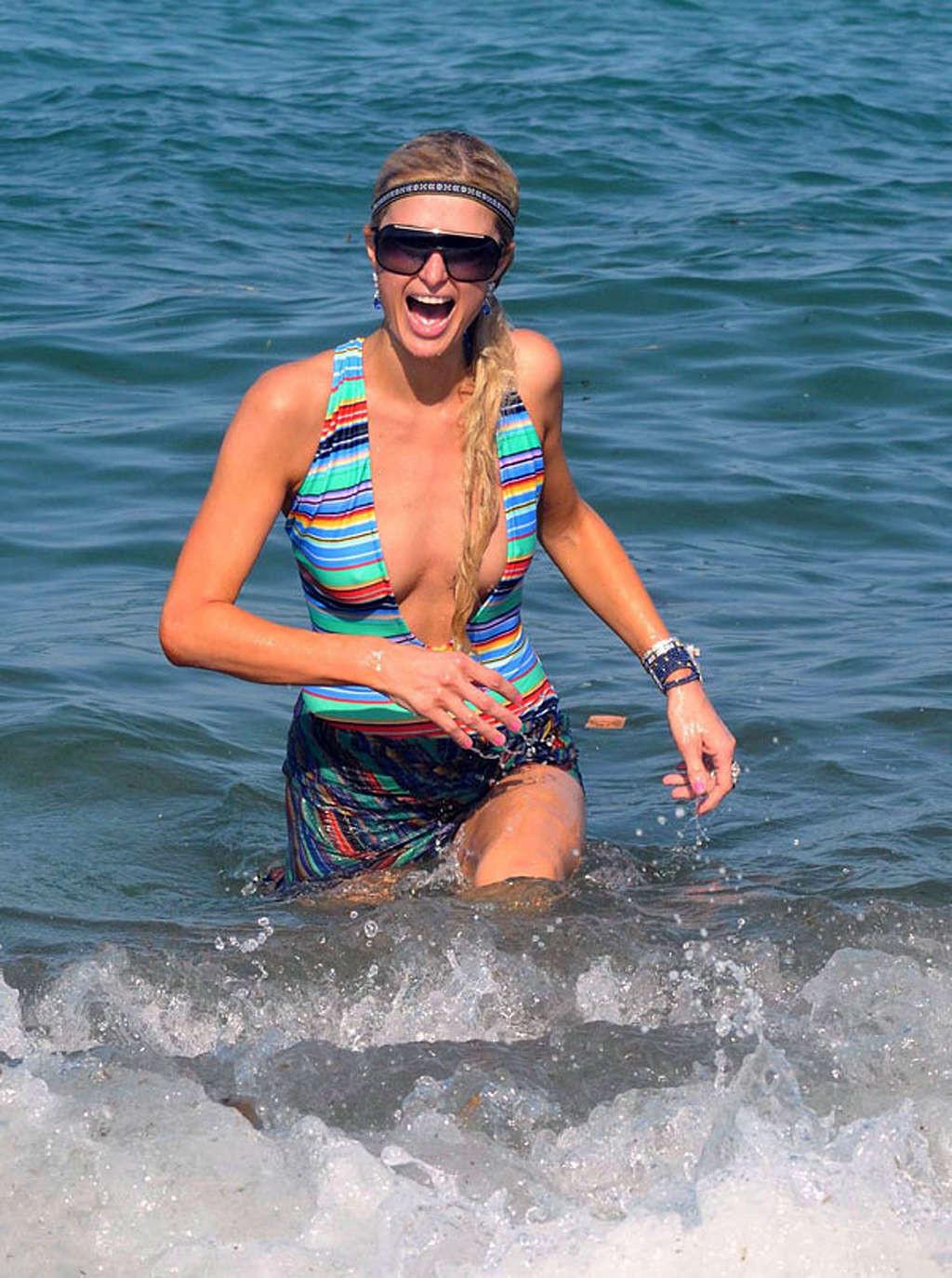 16P Paris Hilton enjoying on yacht in topless and showing sexy body