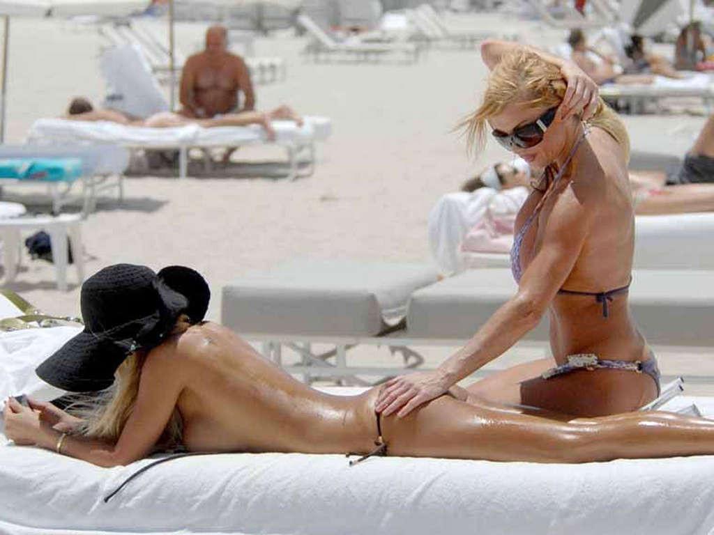 10P Shauna Sand with girlfriend posing topless and in bikini on beach paparazzi pict