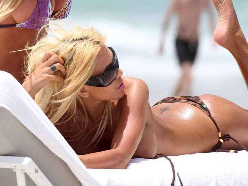 10P Shauna Sand with girlfriend posing topless and in bikini on beach paparazzi pict