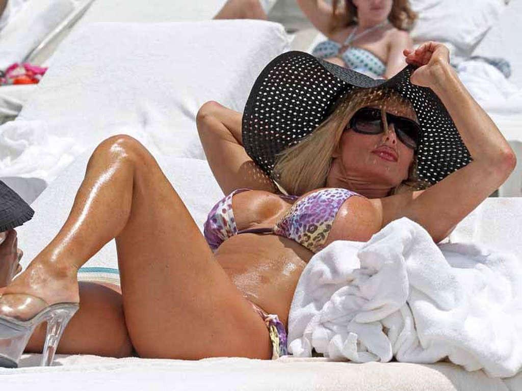 10P Shauna Sand with girlfriend posing topless and in bikini on beach paparazzi pict