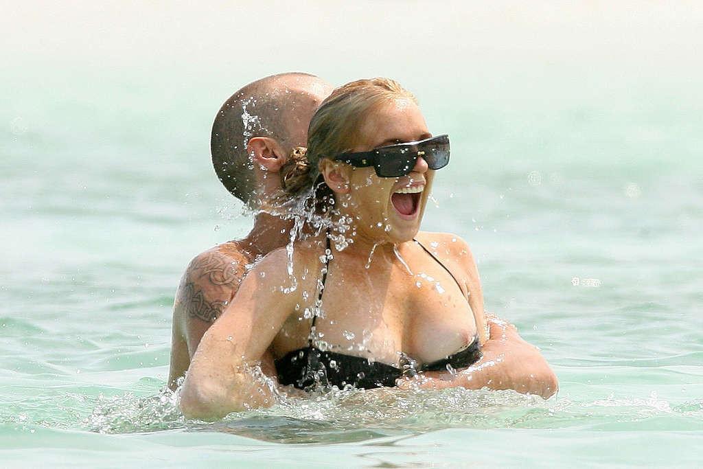 16P Lindsay Lohan leggy in mini skirt and topless shoots