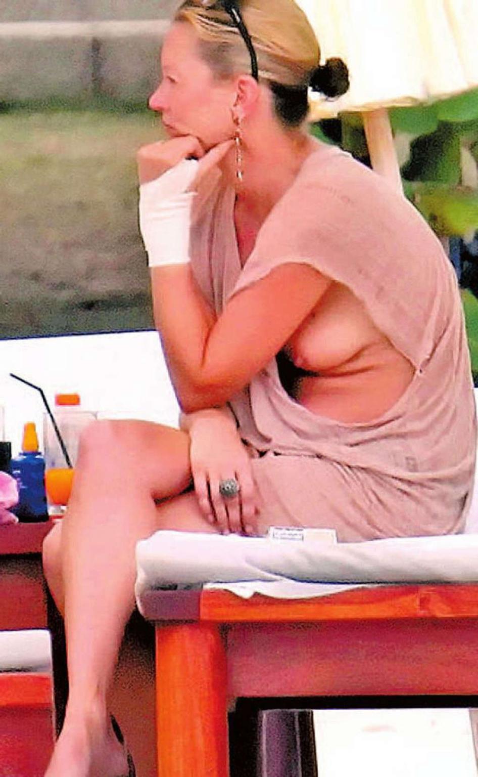 16P Kate Moss leggy on stage and upskirt and topless on beach