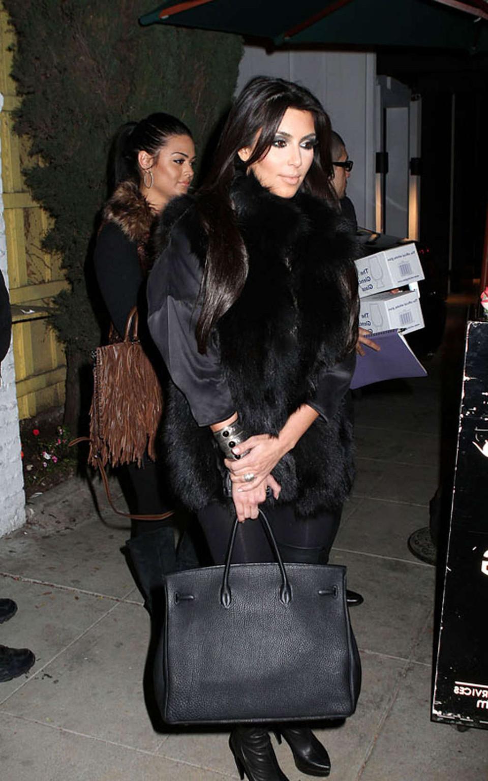 16P Kim Kardashian topless and all in black and high boots
