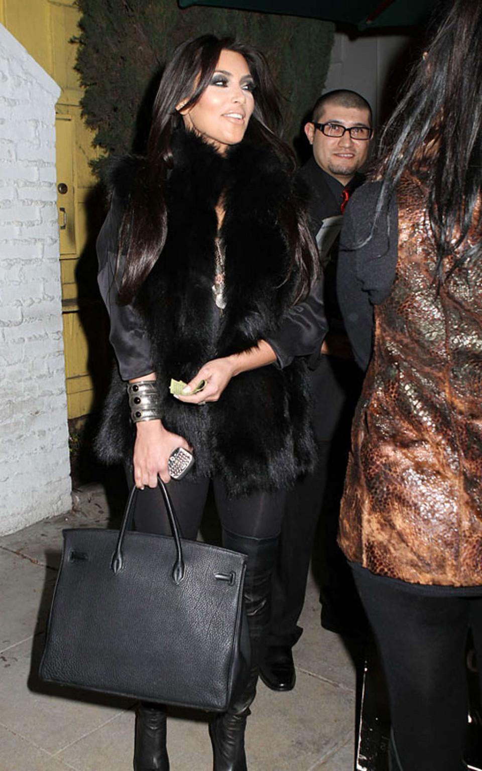 16P Kim Kardashian topless and all in black and high boots