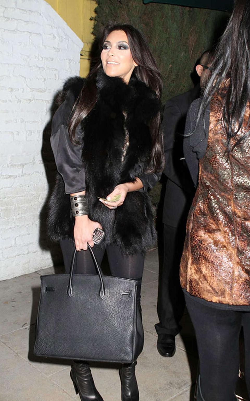 16P Kim Kardashian topless and all in black and high boots