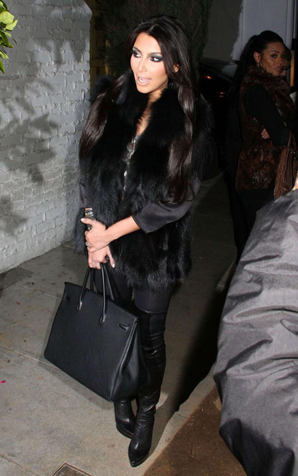 16P Kim Kardashian topless and all in black and high boots