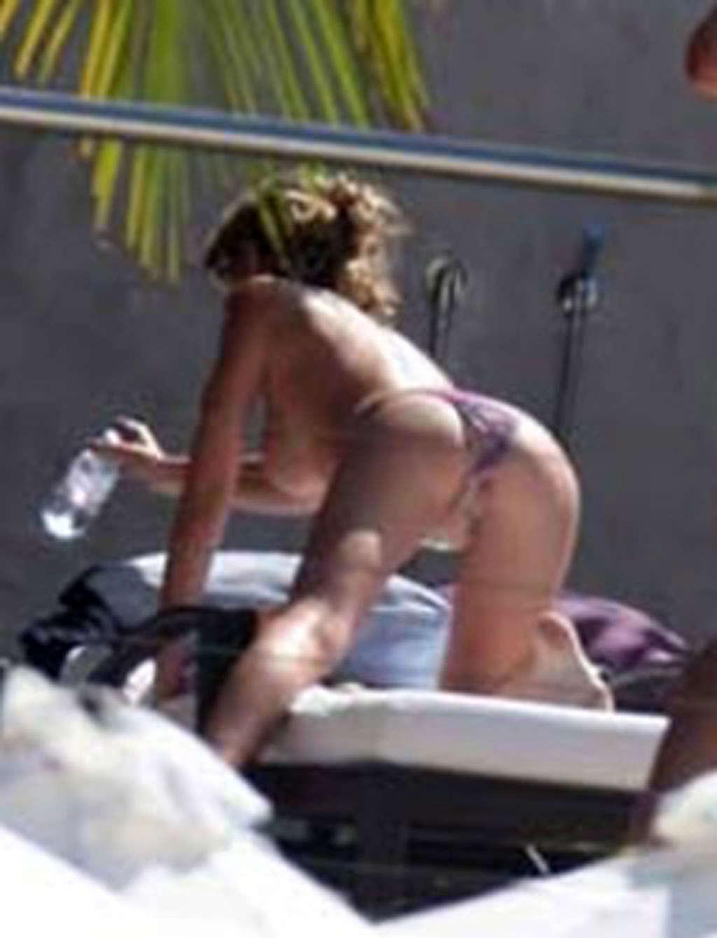 16P Abigail Clancy enjoying on pool in topless and showing sexy body in bikini