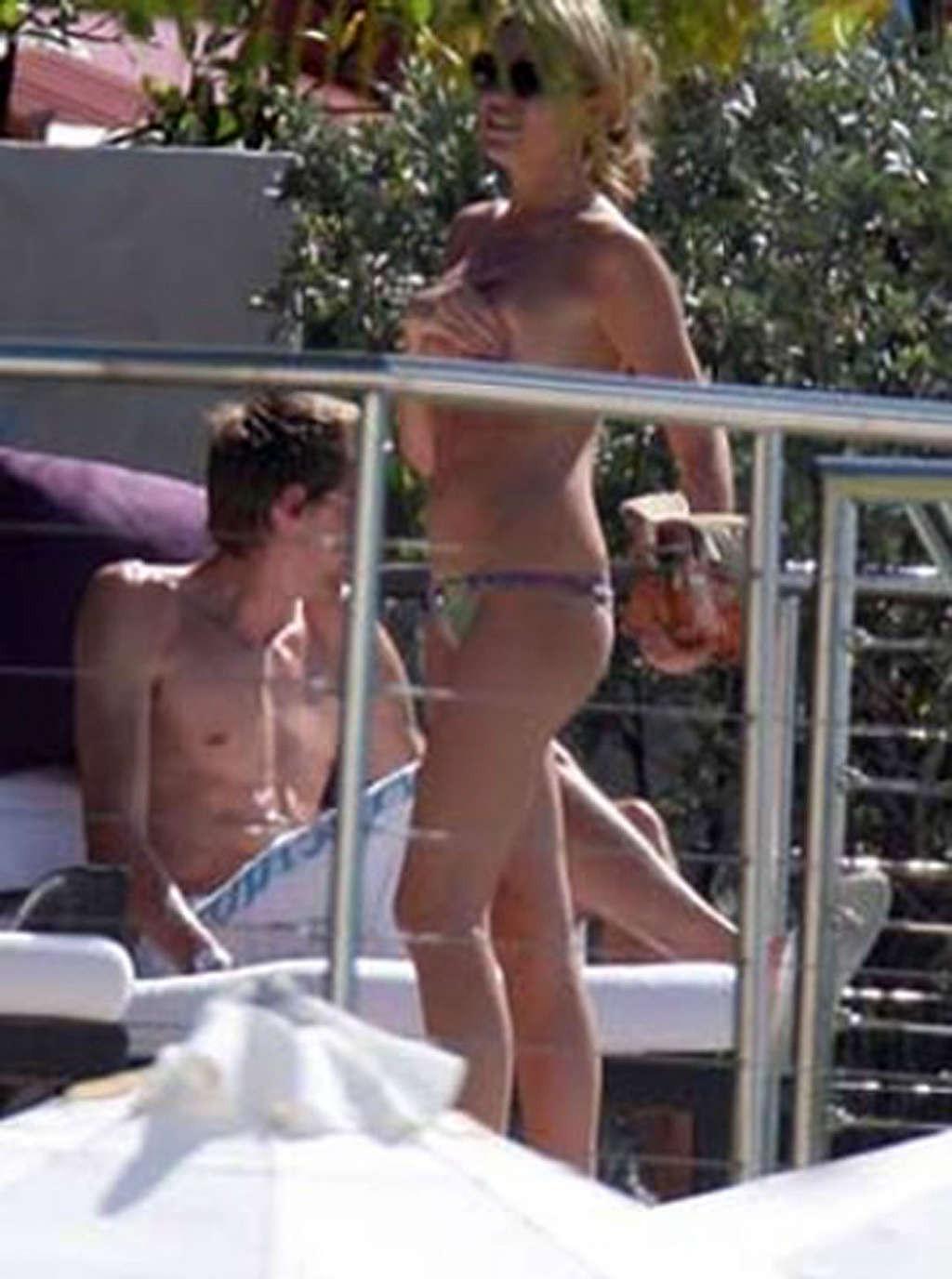 16P Abigail Clancy enjoying on pool in topless and showing sexy body in bikini