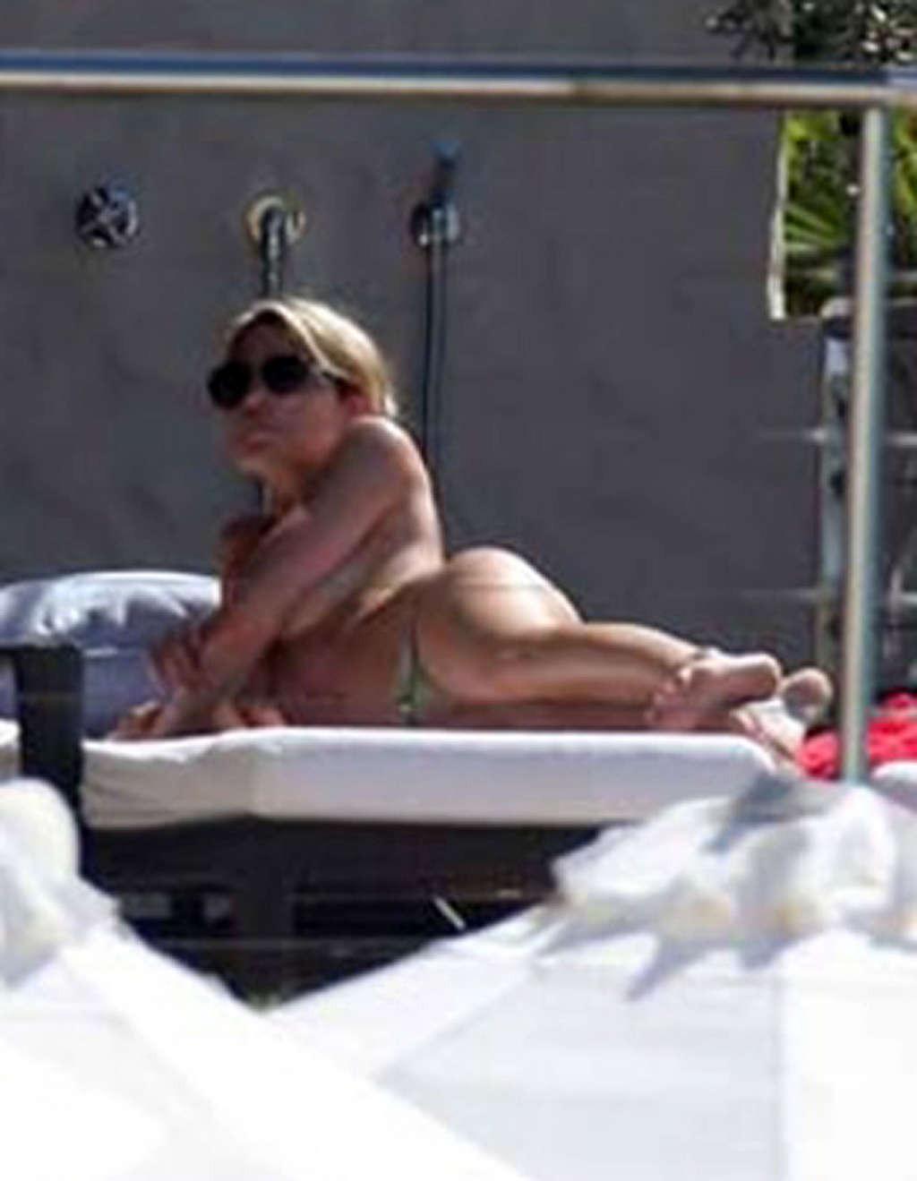 16P Abigail Clancy enjoying on pool in topless and showing sexy body in bikini