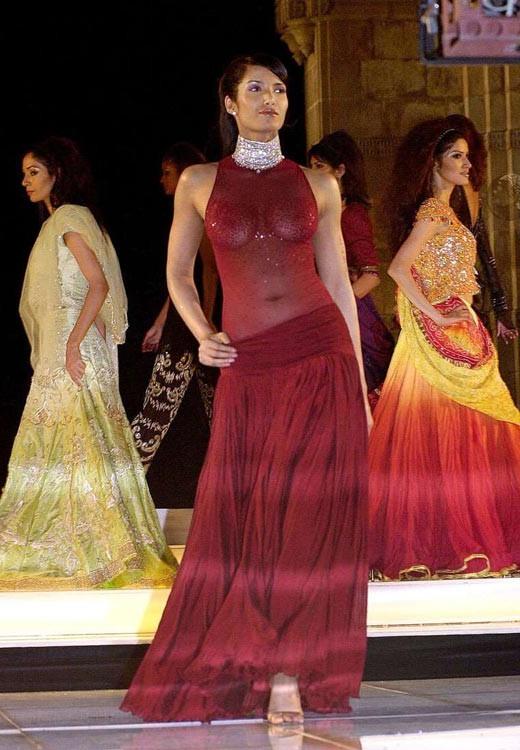 15P Padma Lakshmi juicy boobs in see through shirt