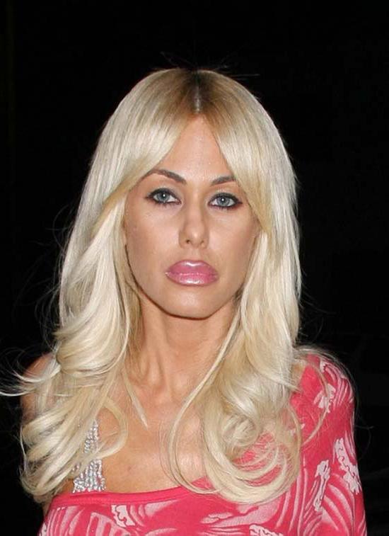 15P Shauna Sand going topless on the beach