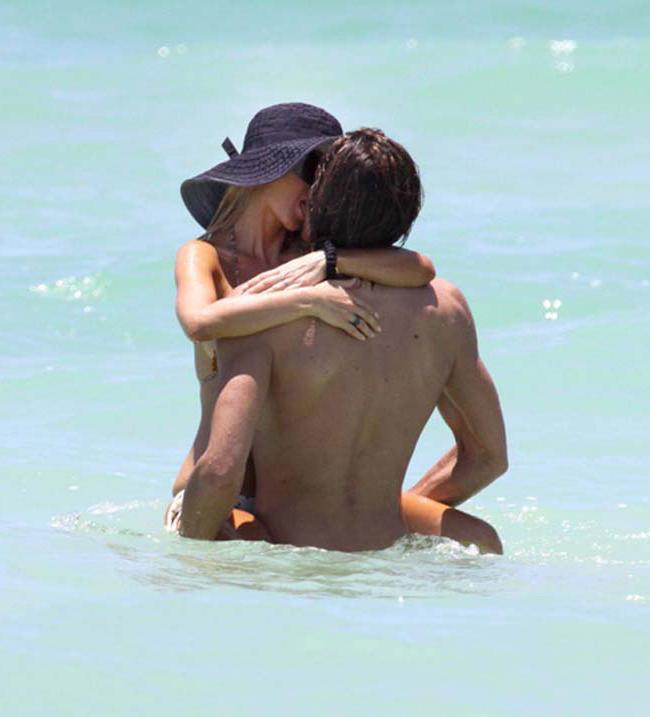 15P Shauna Sand going topless on the beach