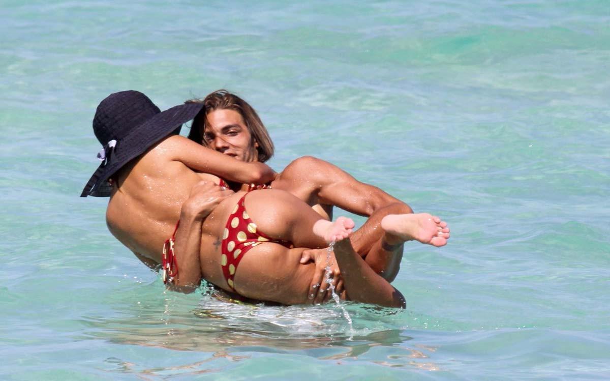 15P Shauna Sand going topless on the beach