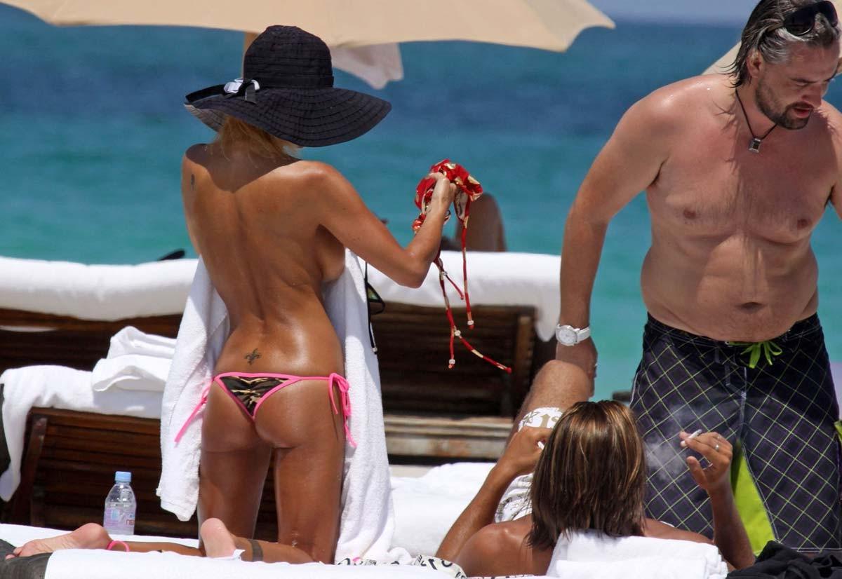 15P Shauna Sand going topless on the beach