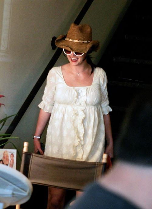 16P Britney Spears posing in topless and bikini paparazzi pictures