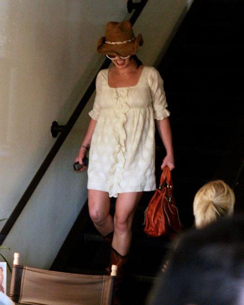 16P Britney Spears posing in topless and bikini paparazzi pictures