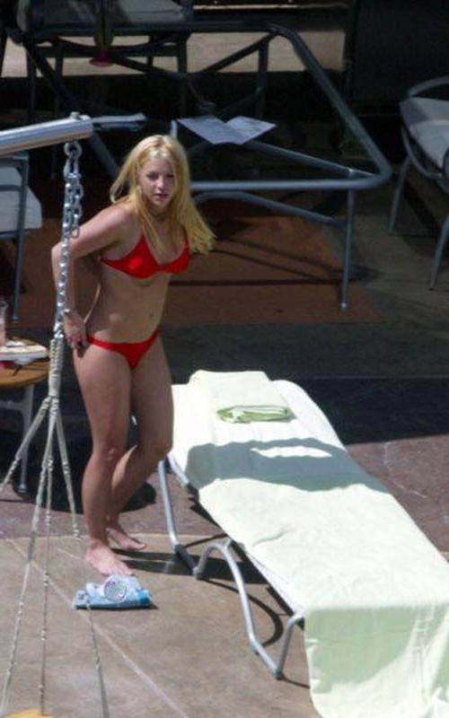 16P Britney Spears posing in topless and beach paparazzi pictures