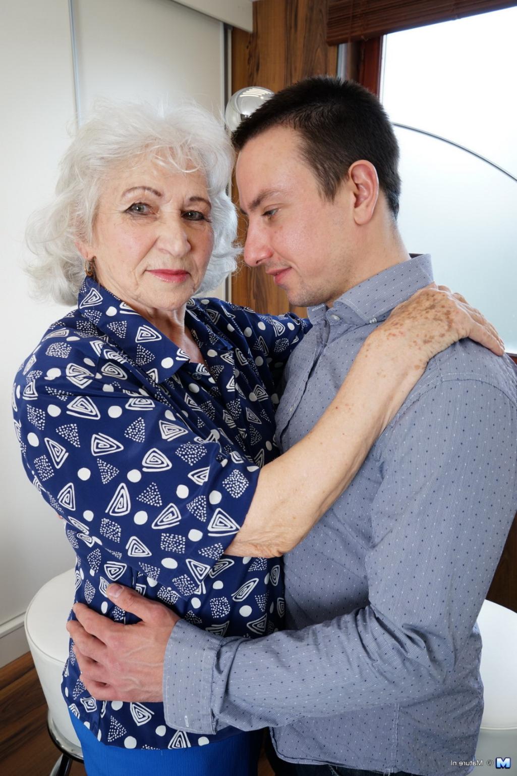 16P Horny toy boy playing around with a hairy granny