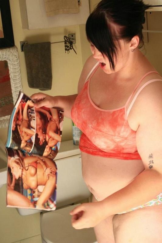15P Chunky Milla finger fucking her twat while reading a porn mag