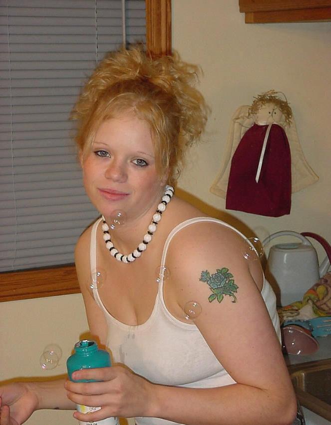 15P Sexy chubby redhead amateur posing