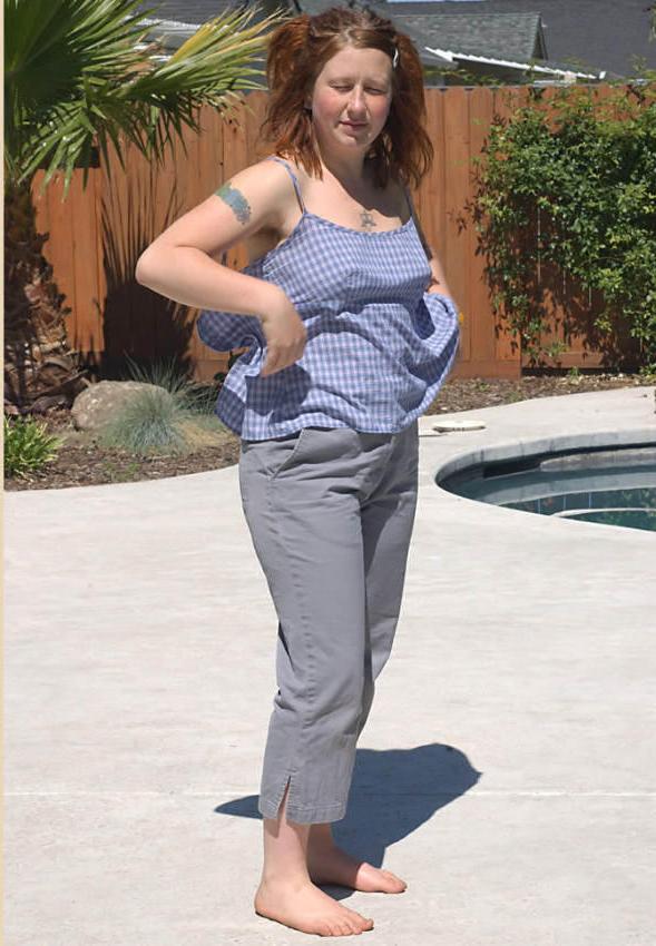 15P Chubby redhead slut posing outdoors