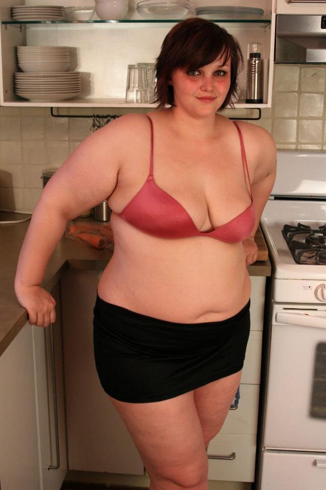 15P Big chubby babe fucks herself with a cucumber in the kitchen