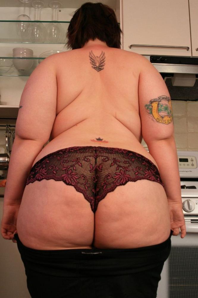 15P Big chubby babe fucks herself with a cucumber in the kitchen