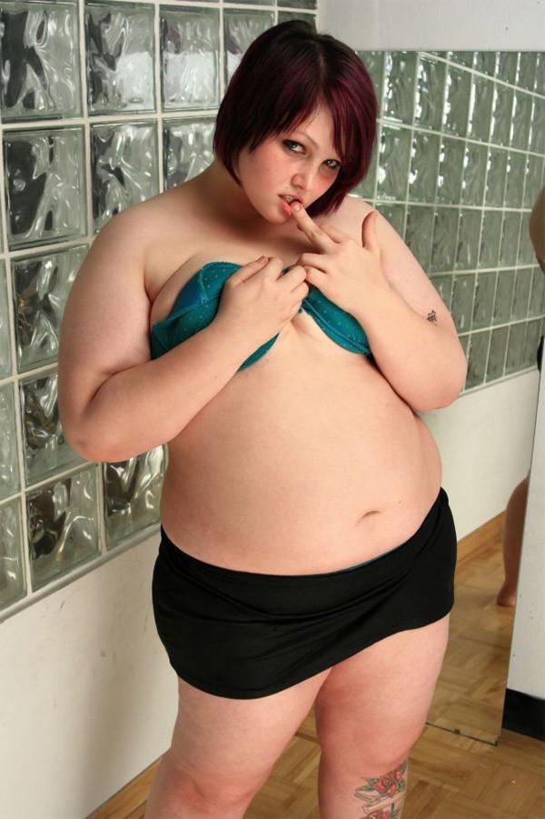 15P Cute plump college chick strips naked showing off her plush body