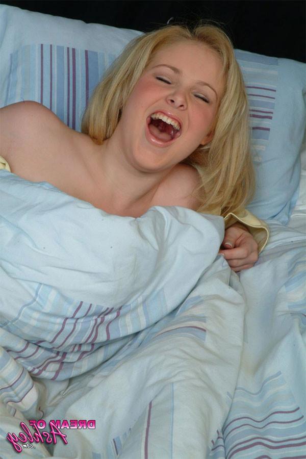 15P Big boobed blonde in bed teasing under her duvet