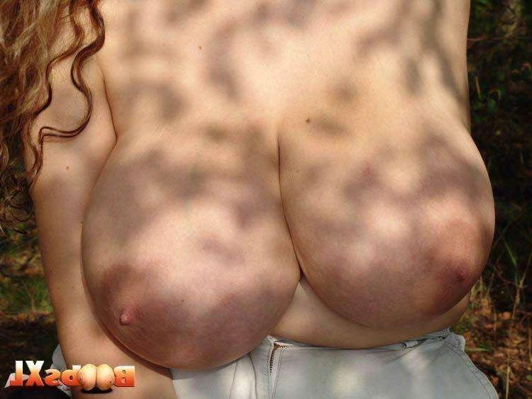 16P Chubby Agnes plays with her huge tits in a forest