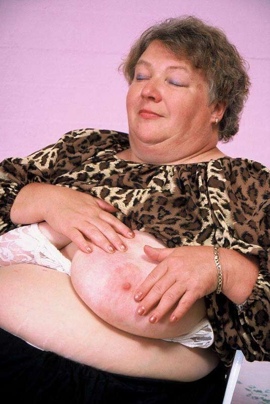 15P Bbw chubby granny showing her huge stomach and big tits