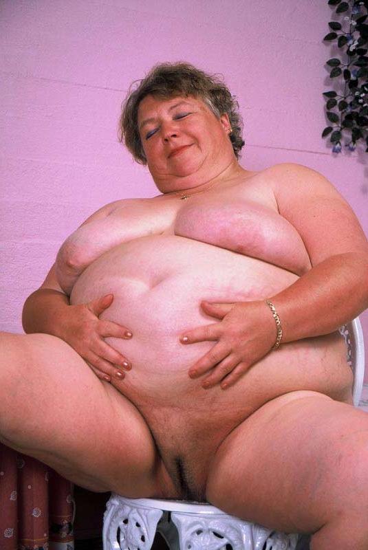 15P Bbw chubby granny showing her huge stomach and big tits