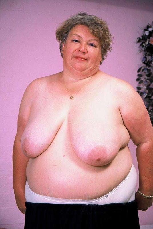 15P Bbw chubby granny showing her huge stomach and big tits