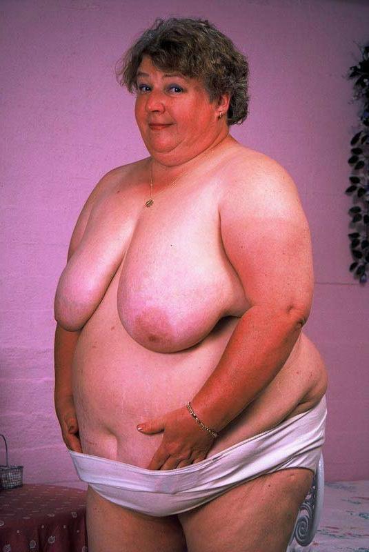 15P Bbw chubby granny showing her huge stomach and big tits