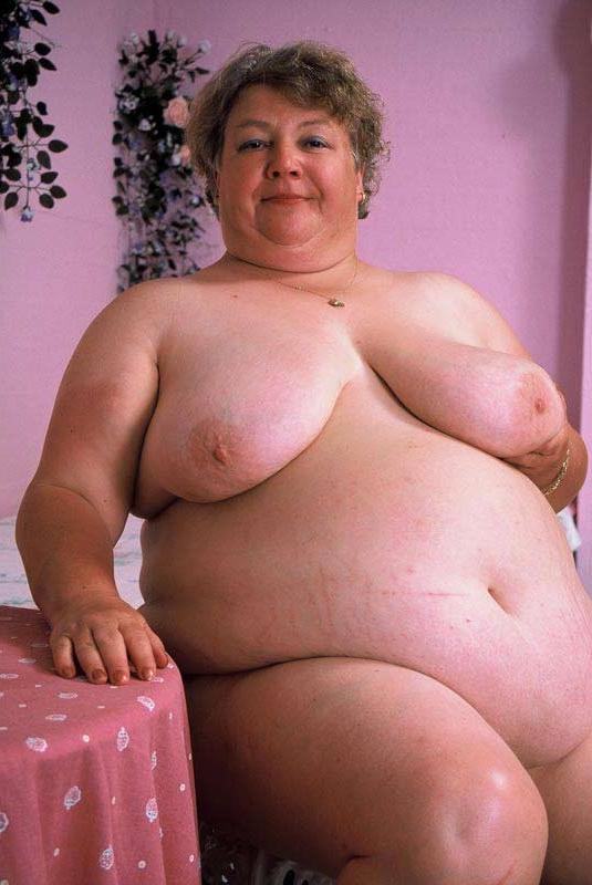 15P Bbw chubby granny showing her huge stomach and big tits