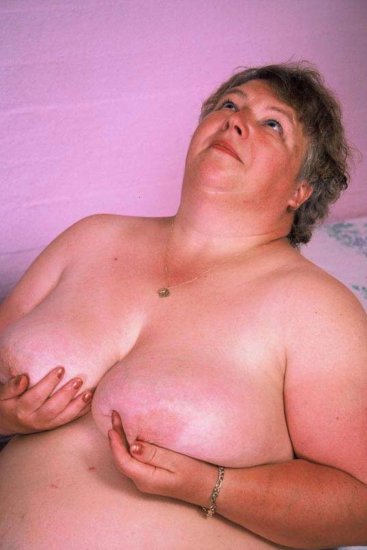 15P Bbw chubby granny showing her huge stomach and big tits