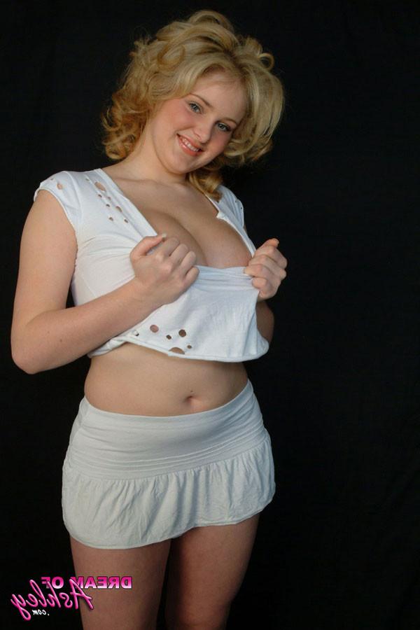 14P Big boob blonde teasing in skimpy clothes