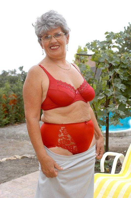 16P Granny in lust is fingering her tight pussy