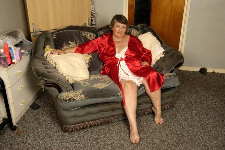 16P Horny fat granny Marcia strips and spreads her old slutty pussy