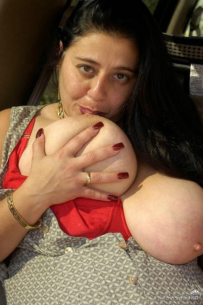 15P mature heavy and hairy tanya sucks on her own titanic titties