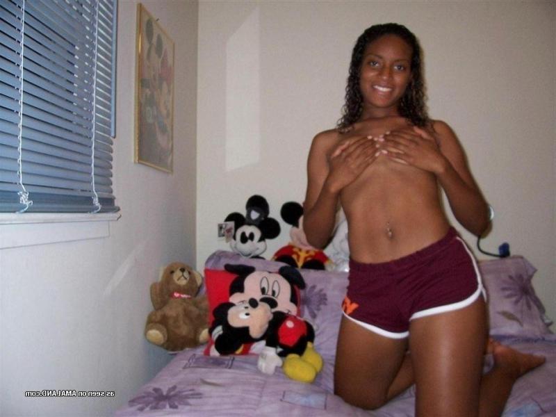 15P Ebony coed strips and fingers her cunt in photo collection