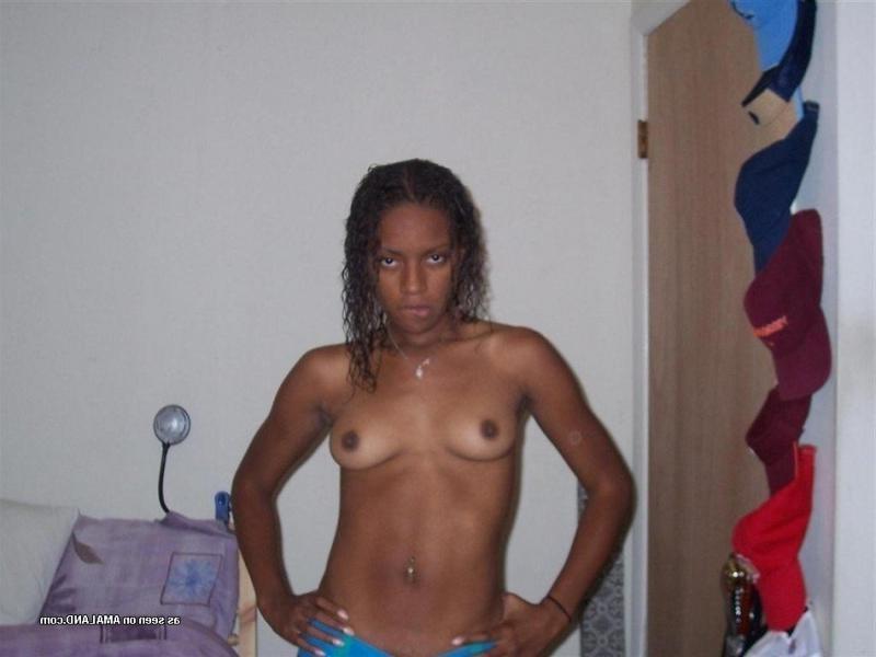 15P Ebony coed strips and fingers her cunt in photo collection