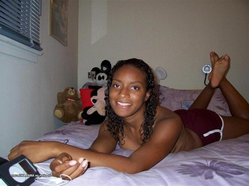 15P Ebony coed strips and fingers her cunt in photo collection