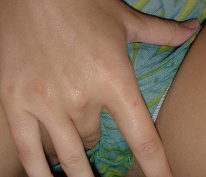 16P Pictures of a masturbating big-tittied chick