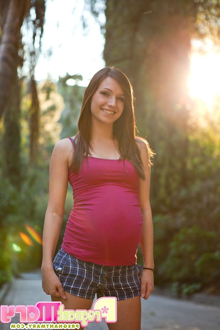 16P Striptease and pregnant pussy play in the outdoors.