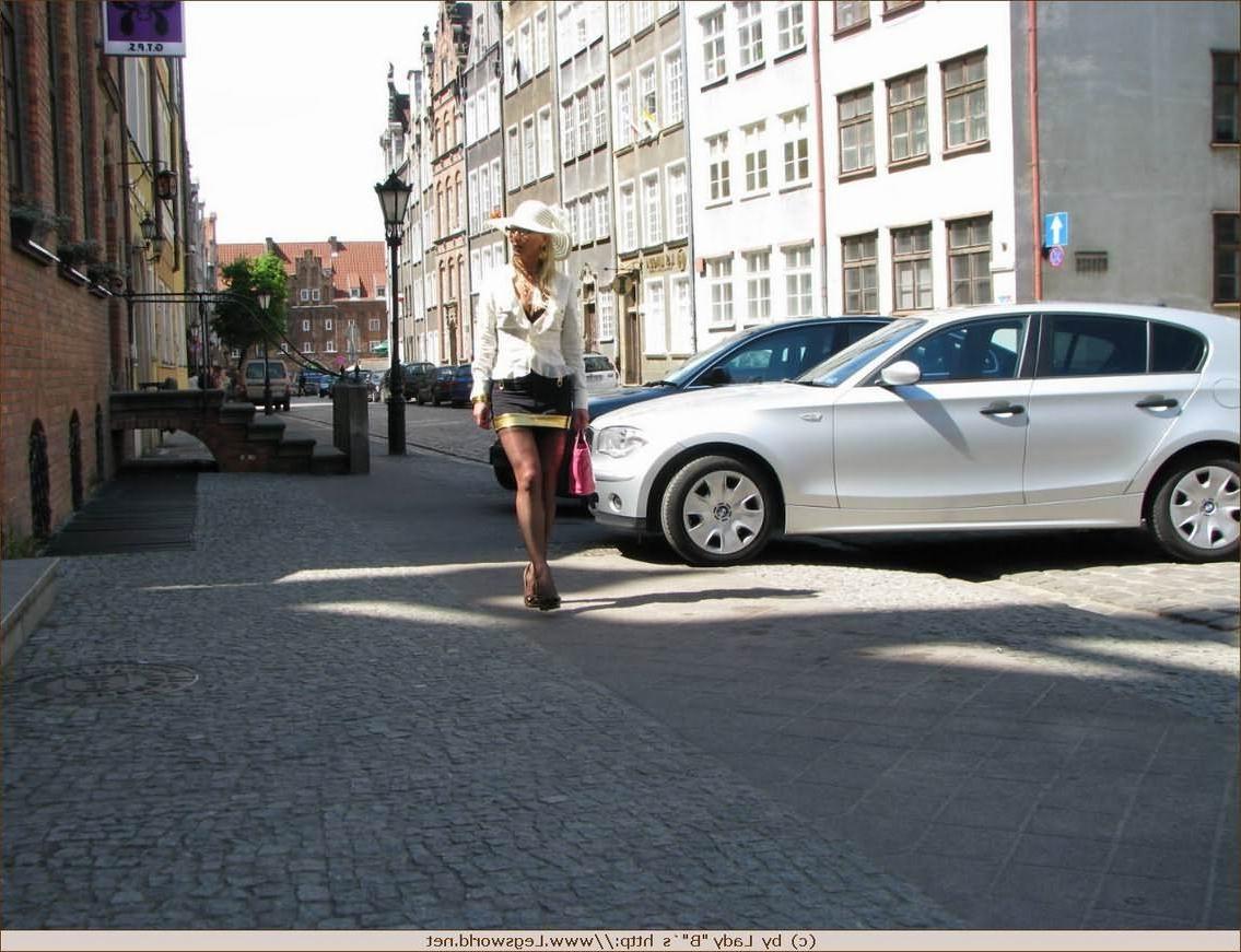 12P German lady Barbara in stockings posing in public