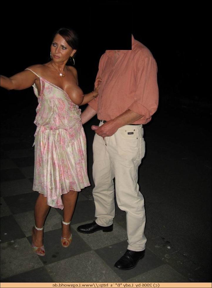 12P Busty german lady jerking off two lucky guys in public