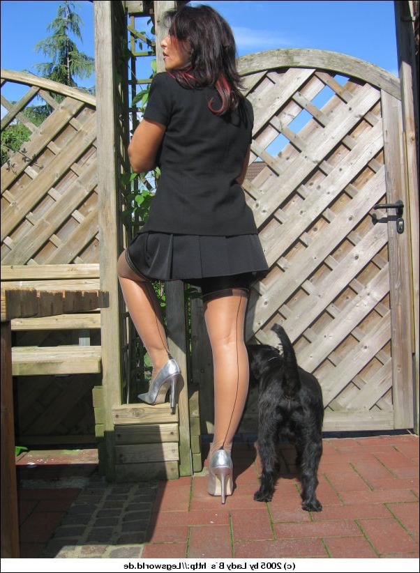 12P German lady displaying her sexy legs
